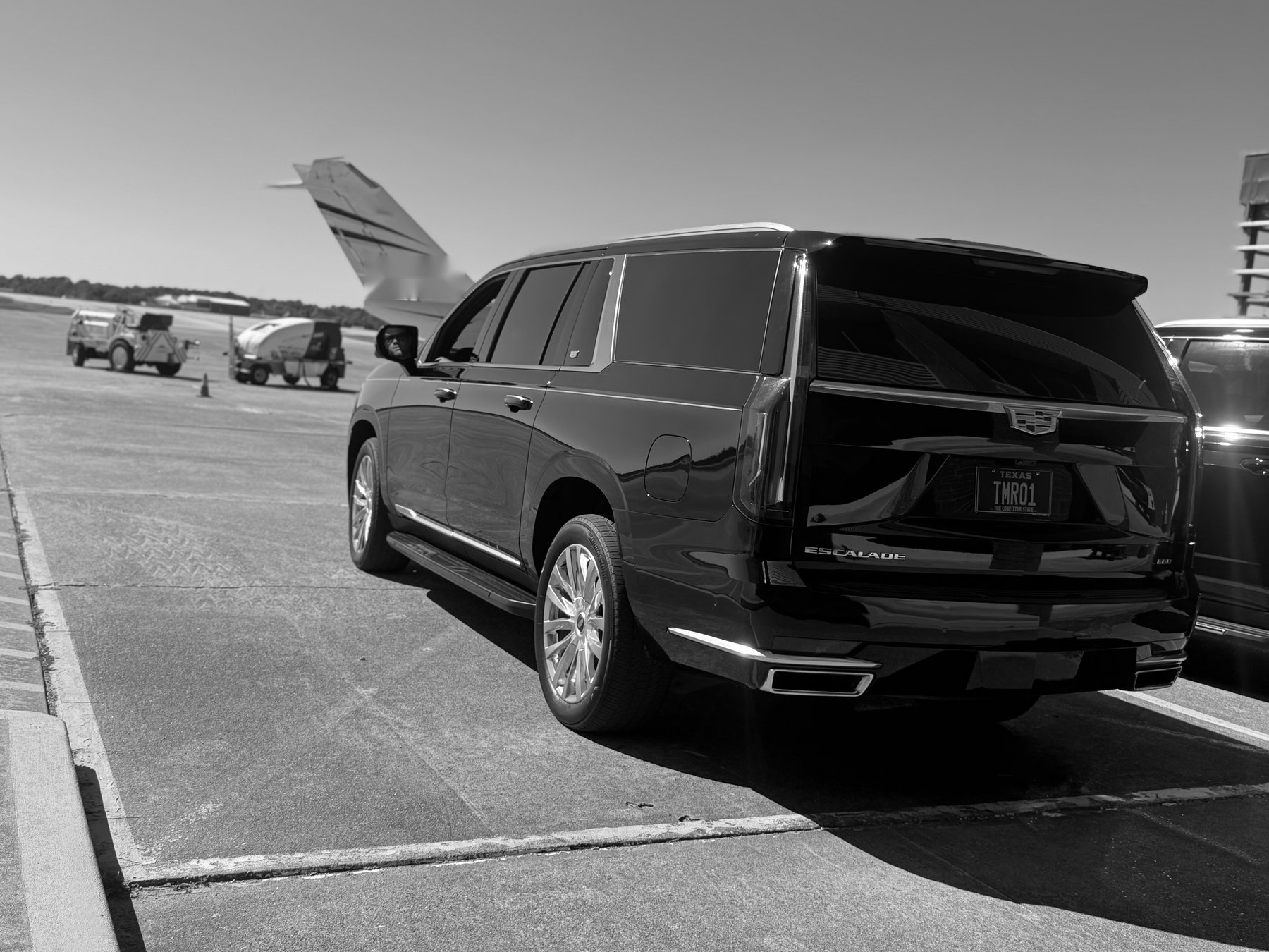 TMR Escalade planeside at a Houston FBO